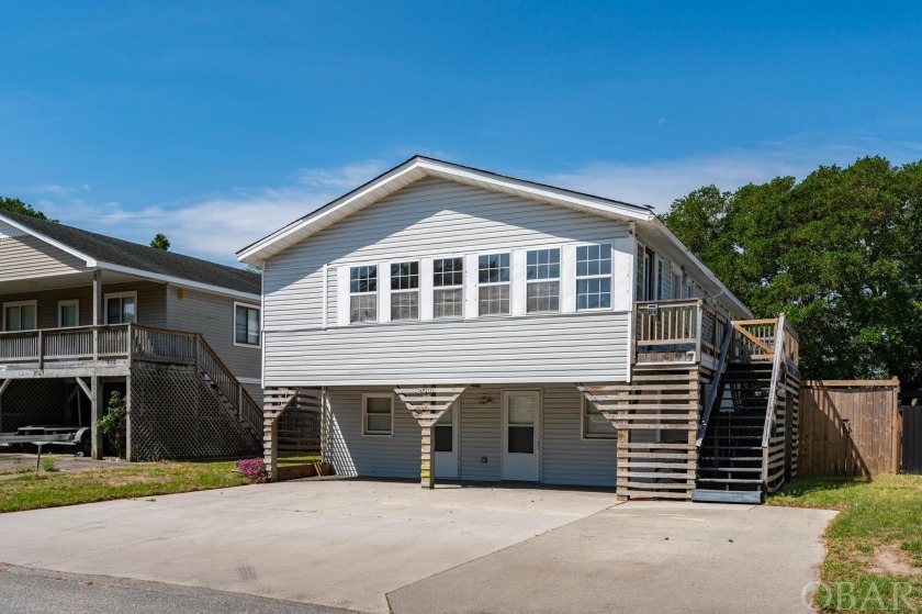 Located in the heart of Kill Devil Hills and flanked by mostly - Beach Home for sale in Kill Devil Hills, North Carolina on Beachhouse.com