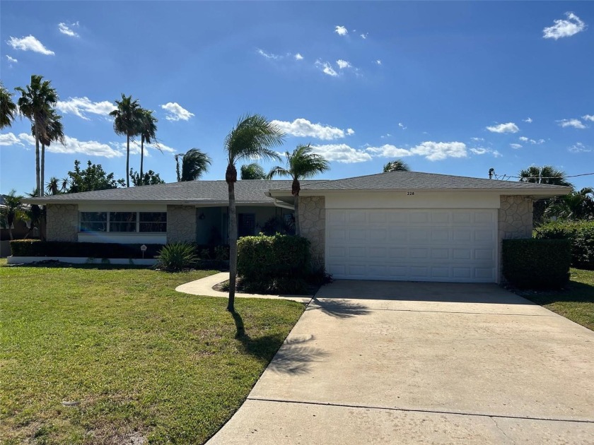 Amazing 100ft south facing deep water lot!!! This 3 bed 2 bath - Beach Home for sale in Belleair Beach, Florida on Beachhouse.com