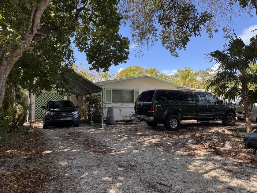 Across from the beach, pool, and boat ramp at popular Founder's - Beach Home for sale in Plantation Key, Florida on Beachhouse.com