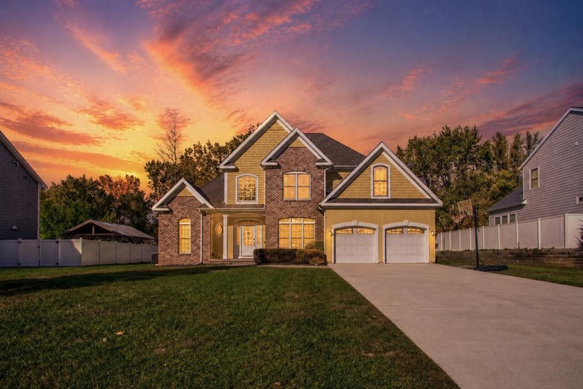 This beautifully designed home offers four generous bedrooms, a - Beach Home for sale in South Haven, Michigan on Beachhouse.com