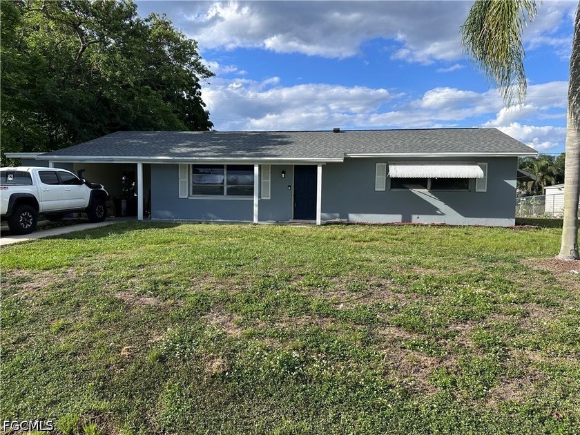 Welcome to a beautifully updated canal-front retreat in the - Beach Home for sale in Lehigh Acres, Florida on Beachhouse.com