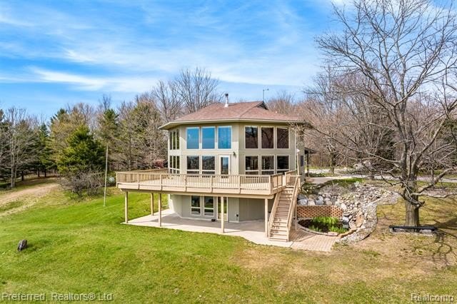 Perched atop 9.53 picturesque acres overlooking a serene valley - Beach Home for sale in Crystal Lake Twp, Michigan on Beachhouse.com