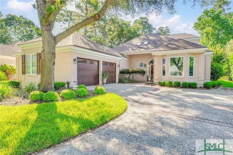 Welcome to this stunning stucco patio home offering captivating - Beach Home for sale in Savannah, Georgia on Beachhouse.com