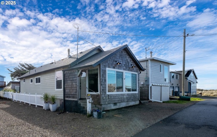 Located just steps from miles of sandy shoreline, this stunning - Beach Home for sale in Rockaway Beach, Oregon on Beachhouse.com