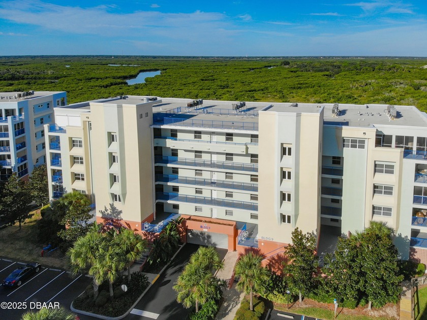 Enjoy stunning estuary and sunset views from this beautifully - Beach Condo for sale in New Smyrna Beach, Florida on Beachhouse.com