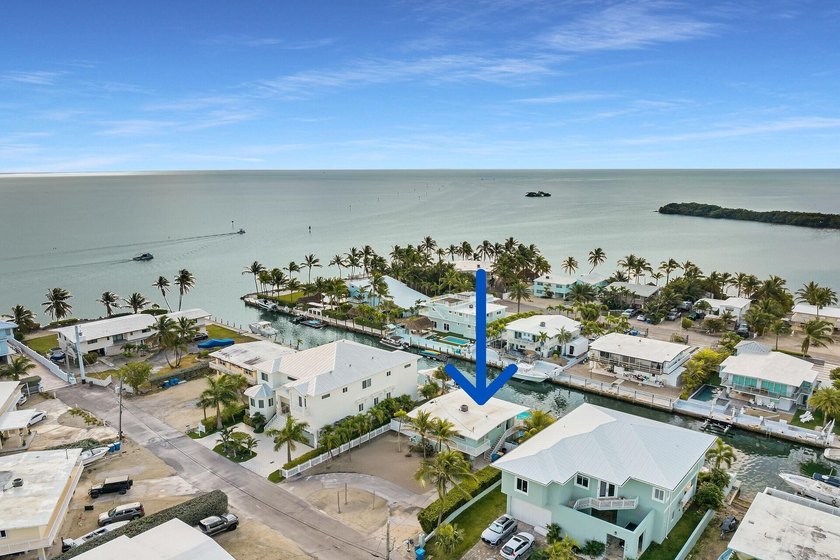 Located just off the ocean off Tavernier Creek, this premier - Beach Home for sale in Plantation Key, Florida on Beachhouse.com