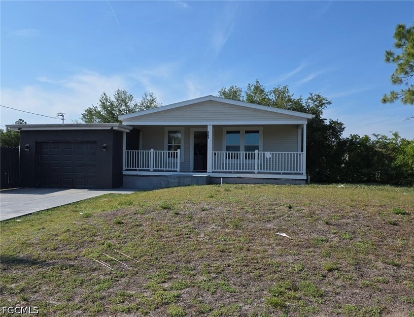 Experience the perfect blend of comfort and convenience in this - Beach Home for sale in Lehigh Acres, Florida on Beachhouse.com