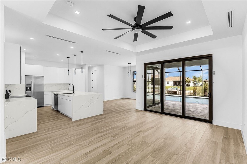 2025 NEW CONSTRUCTION ON THE CANAL WITH CITY WATER AND SEWER. Be - Beach Home for sale in Cape Coral, Florida on Beachhouse.com