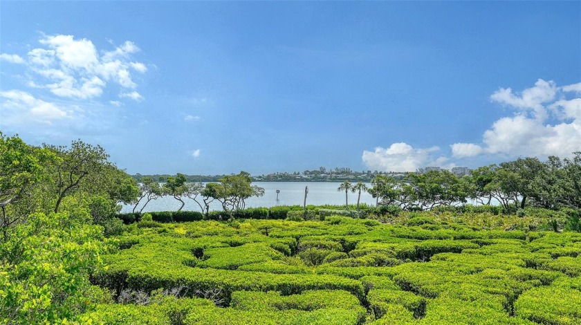 Imagine owning a stunning second-floor end-unit nestled between - Beach Condo for sale in Longboat Key, Florida on Beachhouse.com