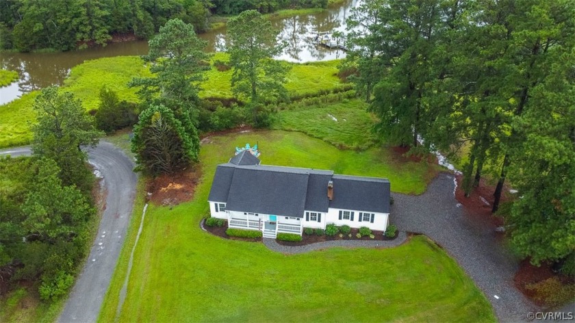 Welcome to your dream home on the beautiful East River! Nestled - Beach Home for sale in Mathews, Virginia on Beachhouse.com