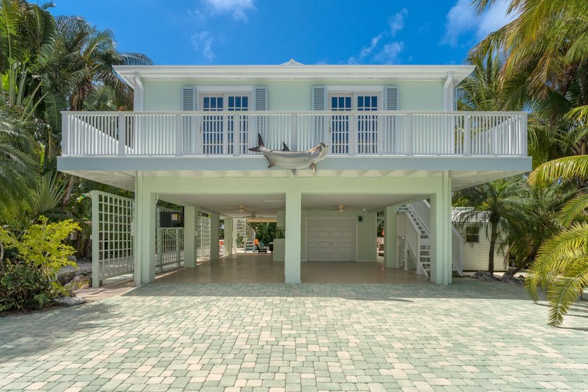 Introducing the Treehouse, tucked within the highly coveted - Beach Home for sale in Key Largo, Florida on Beachhouse.com