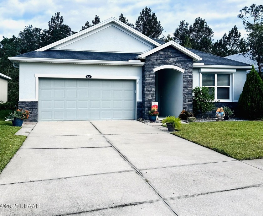 Welcome to this beautifully maintained 4-bedroom, 2-bath home in - Beach Home for sale in Daytona Beach, Florida on Beachhouse.com