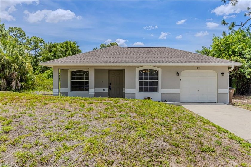 Welcome home to this 3 bedroom, 2 bathroom home located in the - Beach Home for sale in Lehigh Acres, Florida on Beachhouse.com