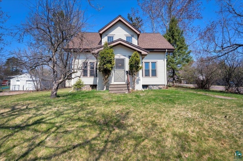 Welcome to 301 W Winona St, a 4-bedroom, 1,556 sqft gem nestled - Beach Home for sale in Duluth, Minnesota on Beachhouse.com