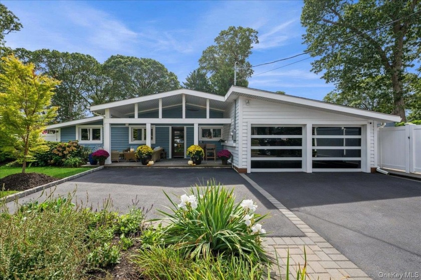 Welcome to Nassau Shores! This beautifully updated ranch will - Beach Home for sale in Massapequa, New York on Beachhouse.com