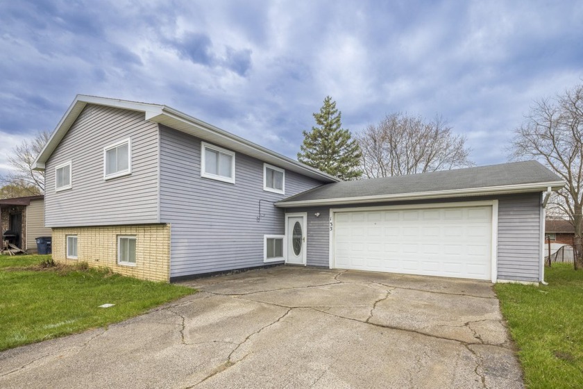 This isn't your average bi-level--this is a spacious, updated - Beach Home for sale in Michigan City, Indiana on Beachhouse.com