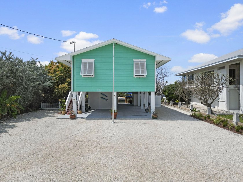 Direct open water access and canal views. Upstairs:3bed/2bath - Beach Home for sale in Marathon, Florida on Beachhouse.com