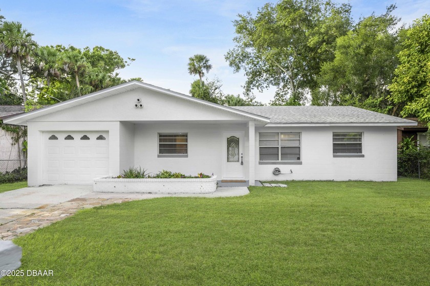 Welcome to this beautifully re-imagined concrete block 3-bedroom - Beach Home for sale in Daytona Beach, Florida on Beachhouse.com