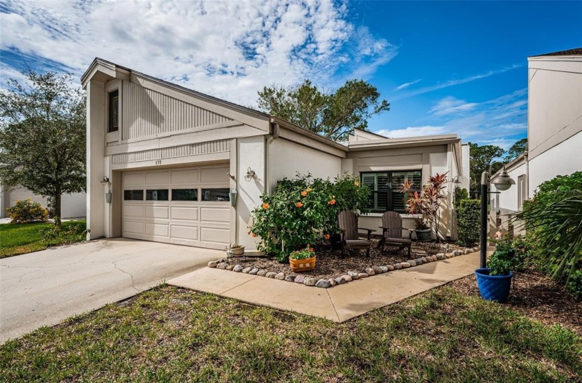 Enjoy gorgeous golf course views plus the privacy of a single - Beach Home for sale in Oldsmar, Florida on Beachhouse.com