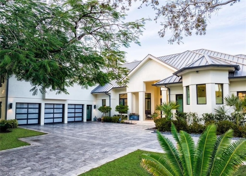 Introducing a luxurious retreat nestled within the prestigious - Beach Home for sale in Naples, Florida on Beachhouse.com