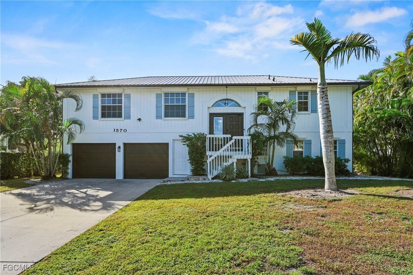 Located in the exclusive waterfront and Gulf-access community of - Beach Home for sale in Naples, Florida on Beachhouse.com