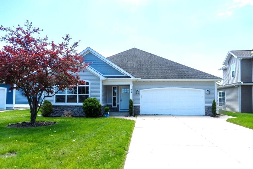 This Three Bedroom Two Bath home features a covered porch on - Beach Home for sale in Benton Harbor, Michigan on Beachhouse.com