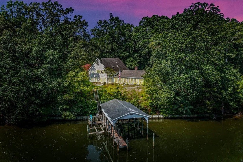 Nestled along the tranquil shores of the Yeocomico River, this - Beach Home for sale in Kinsale, Virginia on Beachhouse.com