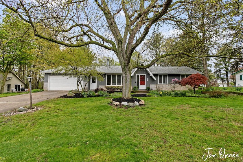 Adorable mid-century ranch on an oversized lot w/ a heated - Beach Home for sale in Holland, Michigan on Beachhouse.com