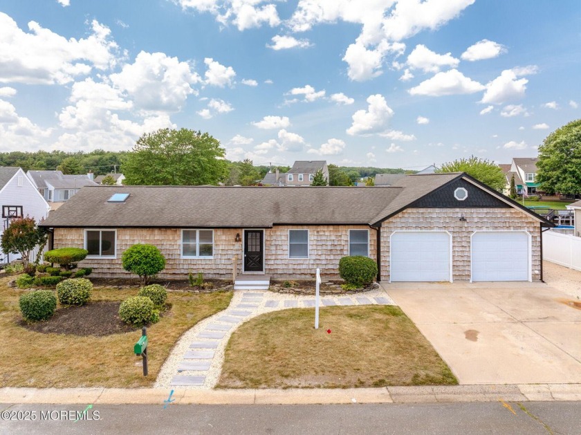Welcome to this beautifully updated ranch perfectly situated on - Beach Home for sale in Manahawkin, New Jersey on Beachhouse.com