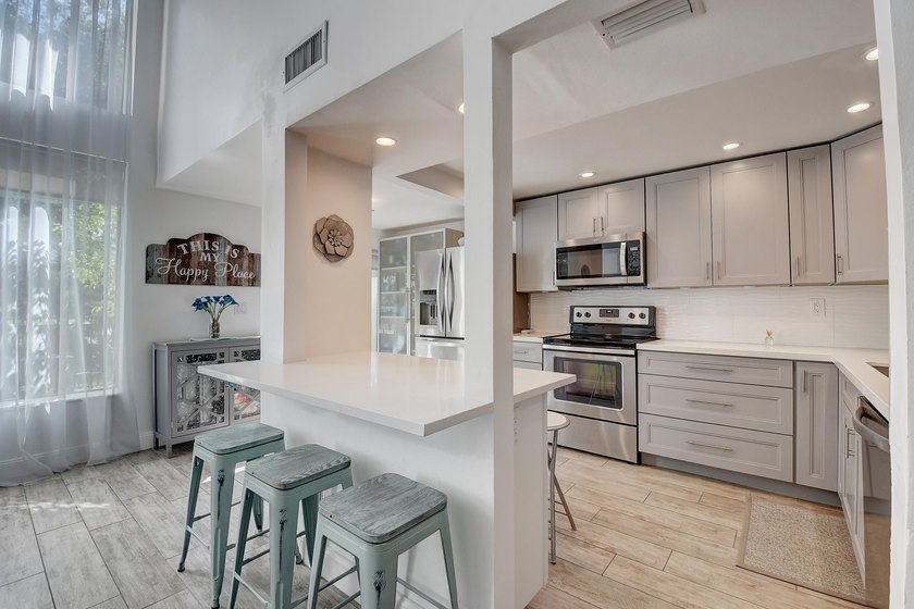 Extremely light and spacious, this fully updated 3-bedroom, 2 - Beach Townhome/Townhouse for sale in Boca Raton, Florida on Beachhouse.com
