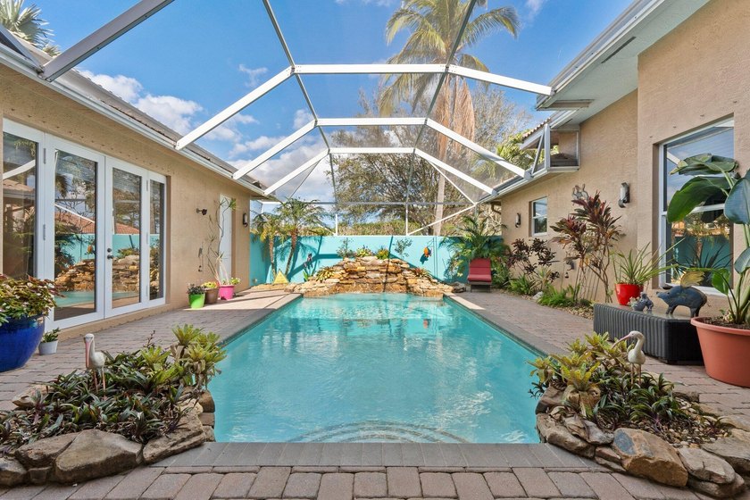 Welcome to this exquisite, move-in ready, custom-built courtyard - Beach Home for sale in Palm City, Florida on Beachhouse.com
