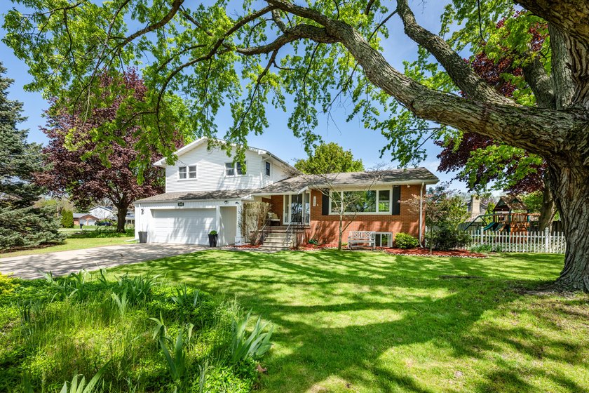 Boasting over 3,000 square feet of finished living space, this - Beach Home for sale in Saint Joseph, Michigan on Beachhouse.com