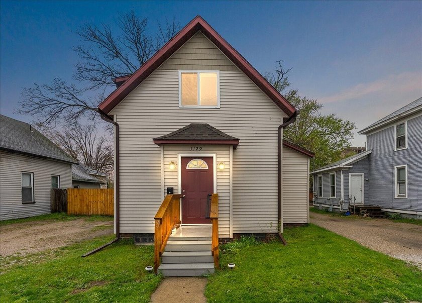 Move in ready and perfectly located! This charming home sits - Beach Home for sale in Muskegon, Michigan on Beachhouse.com