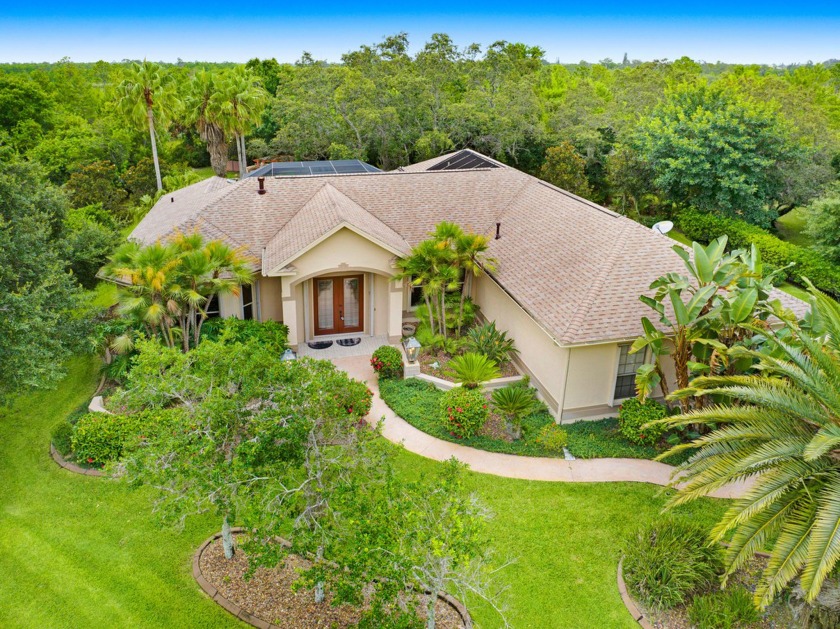 LOCATION! Concrete block safe haven sits on half an acre - Beach Home for sale in Malabar, Florida on Beachhouse.com