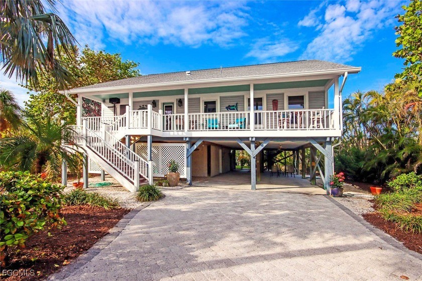 Don't miss the opportunity to own this charming Key West-style - Beach Home for sale in Sanibel, Florida on Beachhouse.com