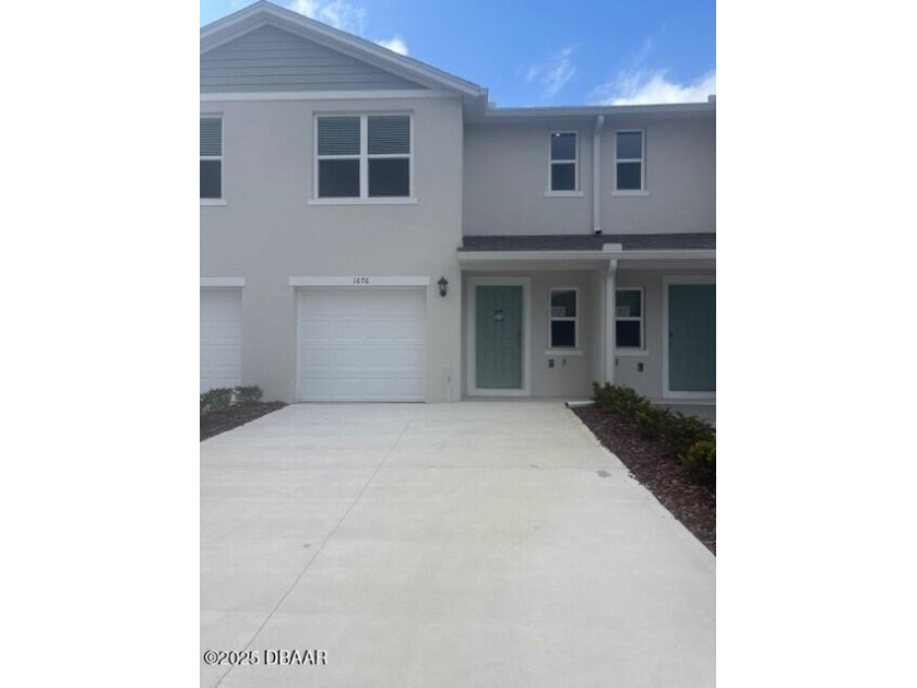 Introducing the Pearson townhome in Sandalwood, offering modern - Beach Townhome/Townhouse for sale in New Smyrna Beach, Florida on Beachhouse.com