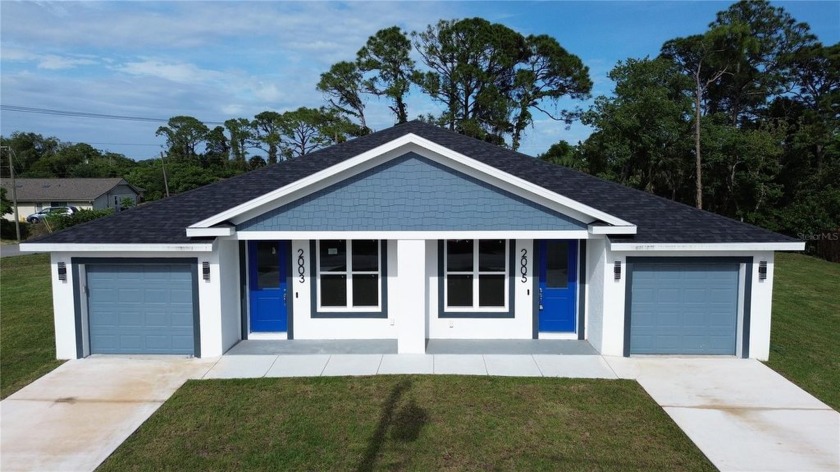 Welcome to this stunning, brand-new duplex just minutes from the - Beach Townhome/Townhouse for sale in Edgewater, Florida on Beachhouse.com