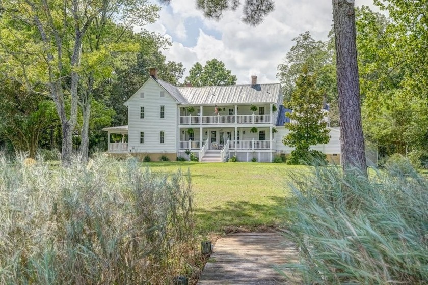 Built in 1875 and reimagined in 2023, this extraordinary estate - Beach Home for sale in Cardinal, Virginia on Beachhouse.com