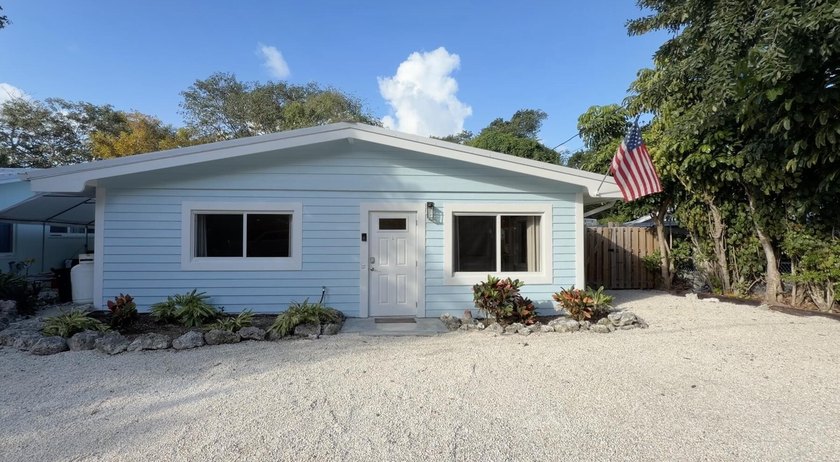 Nestled in the heart of Islamorada, this ground-level residence - Beach Home for sale in Upper Matecumbe Key, Florida on Beachhouse.com