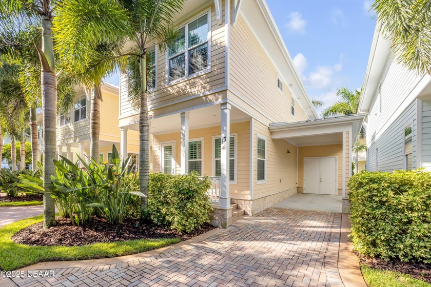 Discover coastal luxury at 13 Old Feger Drive, a Key West-style - Beach Home for sale in New Smyrna Beach, Florida on Beachhouse.com