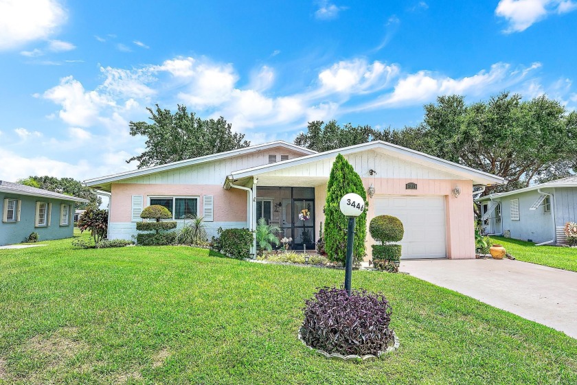 Welcome to this charming 2-bedroom, 2-bathroom home located in a - Beach Home for sale in West Palm Beach, Florida on Beachhouse.com