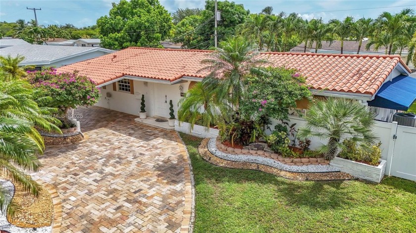 Discover serenity with 1,980 Sqft of covered area pool house in - Beach Home for sale in North Miami Beach, Florida on Beachhouse.com