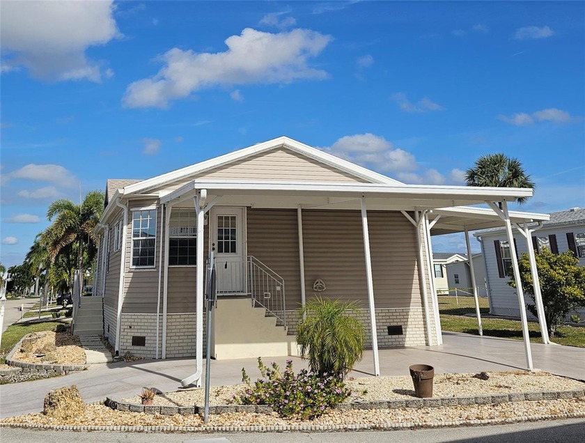 Welcome to this meticulously maintained corner property in - Beach Home for sale in Punta Gorda, Florida on Beachhouse.com