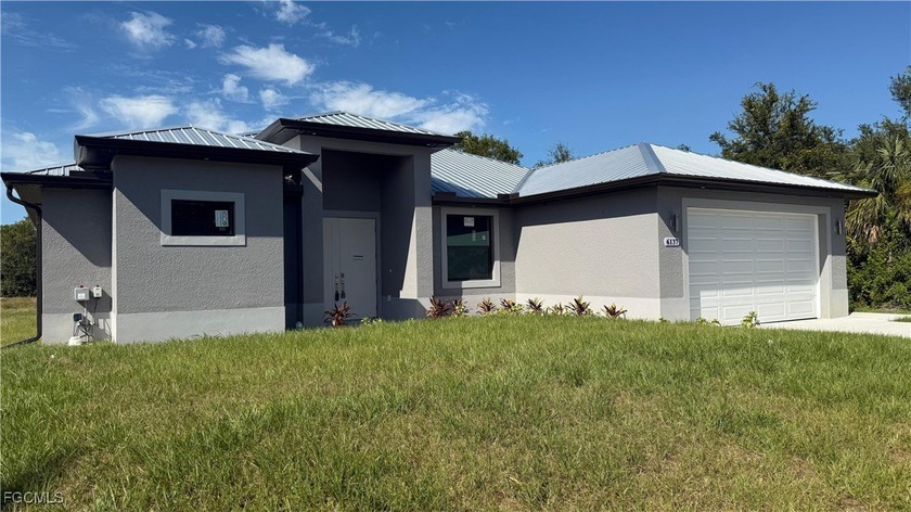 Welcome to this stunning brand-new construction in a prime Fort - Beach Home for sale in Fort Myers, Florida on Beachhouse.com