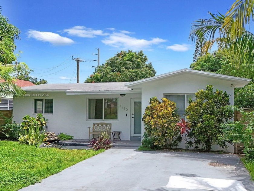 Welcome to this turnkey single-family home conveniently located - Beach Home for sale in North Miami Beach, Florida on Beachhouse.com