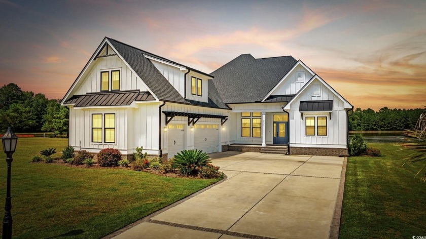 Welcome home to this one-of-a-kind Craftsman style home where - Beach Home for sale in Calabash, North Carolina on Beachhouse.com