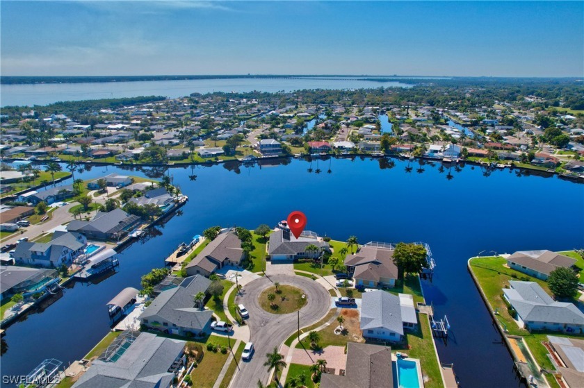 Talk about a Million Dollar View! This Sailboat Access home is - Beach Home for sale in North Fort Myers, Florida on Beachhouse.com