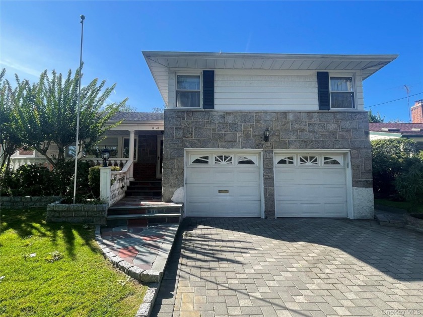 Beautiful brick and stone split-level home in the heart of - Beach Home for sale in Bayside, New York on Beachhouse.com