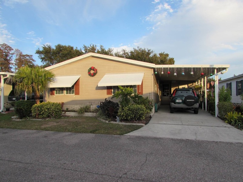 This partially furnished three bedroom two bath 1998 Jacobsen is - Beach Home for sale in Trinity, Florida on Beachhouse.com
