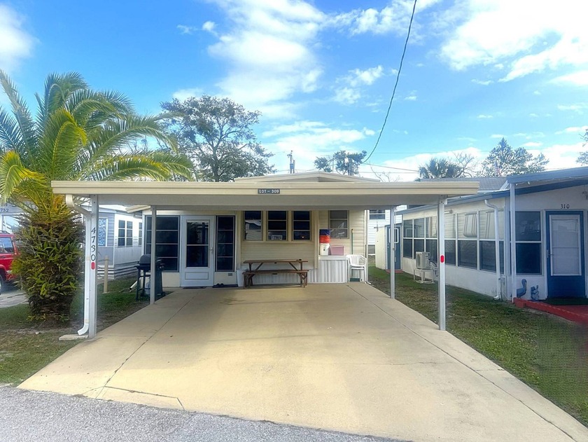 This 2 Bedroom, 1 Bath Partially Furnished Home is in Holiday - Beach Home for sale in Holiday, Florida on Beachhouse.com